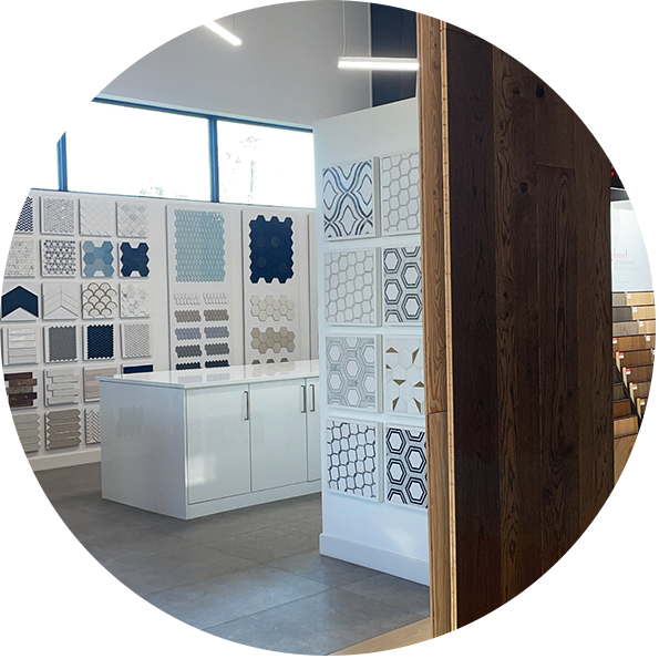 Tile consultation area with sample displays at Flatout Flooring showroom in London Ontario