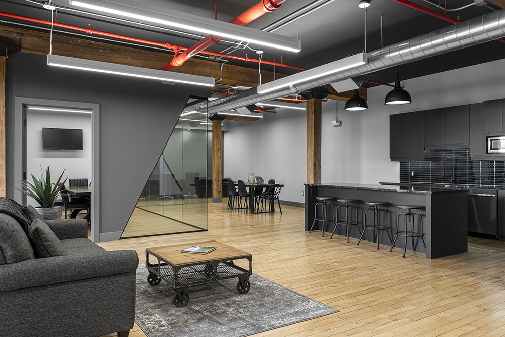 Refinished hardwood floors in stylish office space – Flatout Flooring London ON