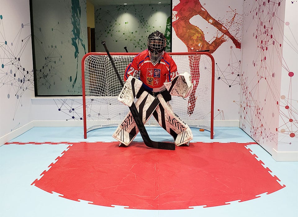 Synthetic ice flooring installed in indoor hockey training space in London, Ontario