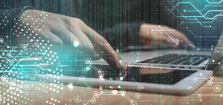 A person types on a laptop with a digital overlay of circuits and binary code, symbolizing technology and innovation in a futuristic setting.