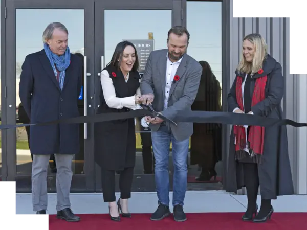 Ribbon cutting at Flatout Flooring to demonstrate event experience design