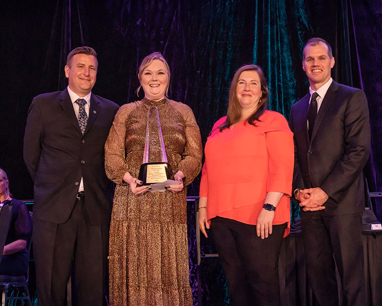Courtney Hance, COO of The Branding Firm, accepting the Small Business of the Year award